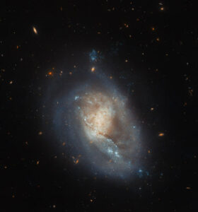 Hubble's Discovery: Dwarf Spiral Galaxy Found In The Coma Constellation