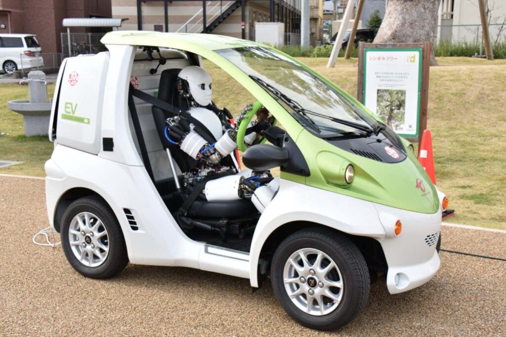Observing A Humanoid Robot Driving A Car At A Very