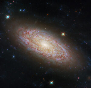 Hubble Space Telescope Spots Spiral Of Condensation In Ngc 2090