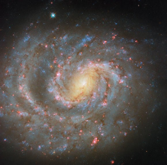The Hubble Space Telescope captures an off-center spiral galaxy The Hubble Space Telescope Captures An Off Center Spiral Galaxy