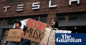 Protesters Object To Elon Musk's Government's Budget Reduction At Tesla