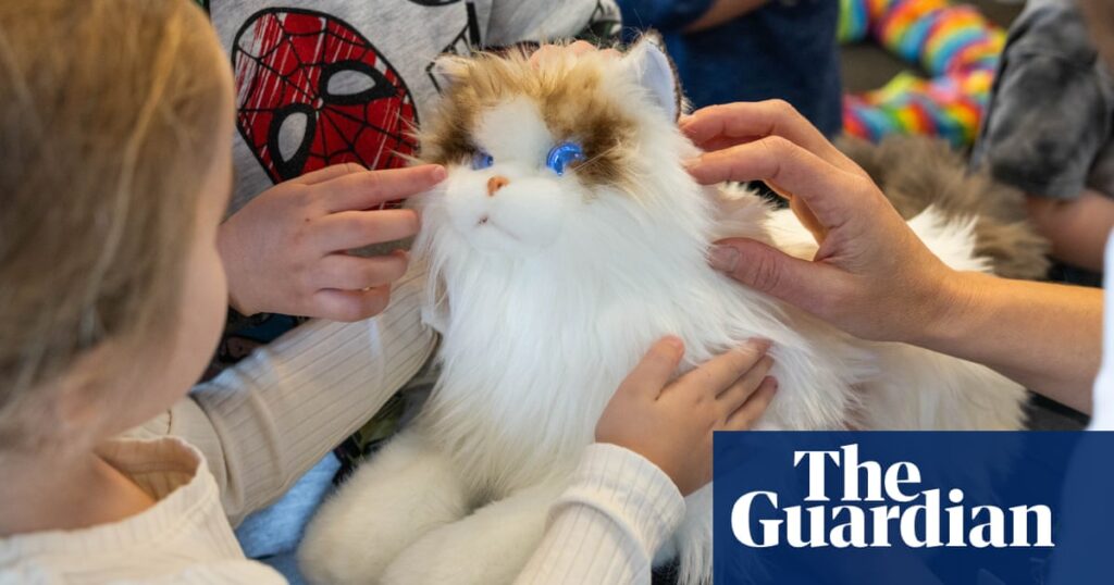 These robotic cats feature glowing eyes and heartbeat technology, offering