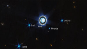 Hubble Explores the Surface Conditions of Uranuss Moons Ariel Umbriel