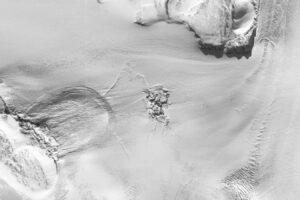 Meltwater Bursts Through Greenland Ice Cap