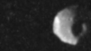 Juno Discovers Rare Close Up of Jupiters Shadow Moon Thebes