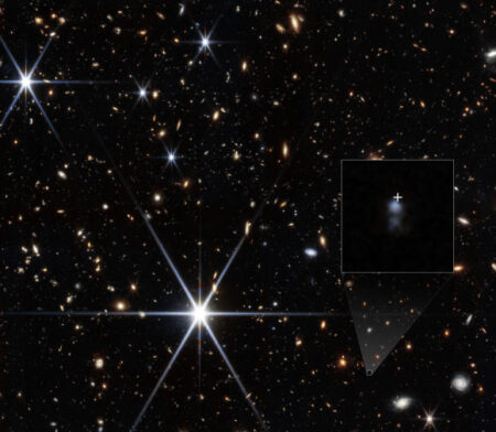 Record breaking high speed radio burst from early Universe traced to tiny